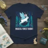 A white rabbit with blue fairy wings and a flower crown, labeled "MAGICAL FOREST RABBIT" on a navy t-shirt