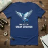 Majestic Urban Explorer text with a detailed illustration of a pigeon in flight on a navy blue t-shirt