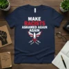 Navy t-shirt with white and red text 'MAKE RACISTS ASHAMED AGAIN AGAIN' and a graphic of a phoenix with broken