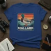 Mallard Wildlife Expeditions t-shirt design featuring a mallard duck by a lake at sunset
