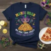 Navy t-shirt with Mardi Gras text "We Don't Hide Crazy Down The Street" above a pizza and mask graphic. Includes