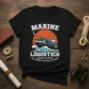Marine Logistics Global Shipping t-shirt with a cargo ship on waves and sunset graphic. Text reads DELIVERING THE WORLD'S GOODS