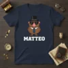 T-shirt featuring the name MATTEO in bold white lettering below a cartoon character wearing a top hat and sunglasses
