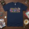 Navy t-shirt with colorful "MAXIMALIST and then some" text and decorative elements like crowns, masks, and butterflies