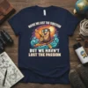 Kayaking otter t-shirt with text "Maybe We Lost The Direction But We Havn't Lost The Passion" in a vibrant sunset