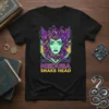 Medusa Snake Head graphic t-shirt design with purple snakes for hair and green face on black tee