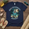 Mele Kalikimaka Beaches text with a T-Rex dinosaur wearing sunglasses and a lei on a tropical beach scene