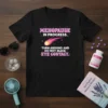 Black t-shirt with pink text: "MENOPAUSE IN PROGRESS. TURN AROUND AND DO NOT MAKE EYE CONTACT." featuring a comet graphic