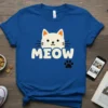Blue t-shirt with a white cat face and the word "MEOW" in cream letters, accompanied by a black paw print