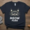 Meow Purr T-Shirt featuring a stylized cat face and the words "MEOW PURR" in bold white text