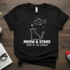 Meow & Stars Paws in the Cosmos t-shirt design with a black cat looking at a fish and stars, white