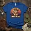 Meowdy cowboy cat t-shirt design with a cat wearing a cowboy hat and bandana, set against a desert sunset background