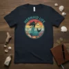 Vintage retro sunset t-shirt design featuring the text "Mermaid Life" and a silhouette of a mermaid holding a lantern