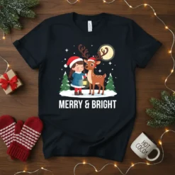 Merry & Bright Christmas T-Shirt featuring a girl with a lantern and a reindeer in a snowy scene