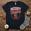 Merry Christmas t-shirt design with fireplace, Christmas tree, and festive text