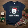 Merry Pitmas T-Shirt featuring a pitbull wearing a Santa hat with festive Christmas patterns and text