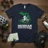 Michigan Mountain Biking t-shirt design featuring a cyclist on a trail within the Michigan state outline