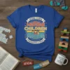 Blue t-shirt with "MIDDLE CHILDREN MATTER PEACEKEEPER & PROUD" text, featuring three cartoon children and a retro sunset graphic