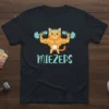 Black t-shirt with a cartoon muscular orange cat lifting barbells, text "MIEZEPS" below, gym theme