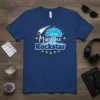 Migraine Rockstar t-shirt design featuring blue cloud graphic, shooting star, and yellow stars with bold white text