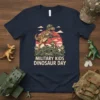 Military Kids Dinosaur Day t-shirt with a T-Rex and cartoon soldiers design, featuring camouflage patterns and military gear