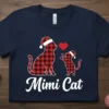 Mimi Cat t-shirt with two plaid cats wearing Santa hats and a red heart graphic