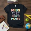 Miss Smarty Pants text with glasses graphic on a black t-shirt, perfect for teachers