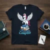 Mission Complete Nurse Unicorn T-Shirt design featuring a winged unicorn on books, wearing a nurse cap and stethoscope