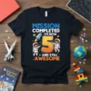 Mission Completed I'm Now 5 And Still Awesome text with astronauts and rocket on a dark t-shirt