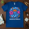 Blue t-shirt with white text "MODERN BOTANICALS" below a colorful floral graphic