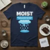 Navy t-shirt with "MOIST BECAUSE AT LEAST ONE PERSON YOU KNOW HATES THIS WORD" text and a cartoon rain cloud