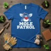 Mole Patrol T-Shirt featuring a cartoon mole wearing a bandana and holding shovels, with bold white text "MOLE PATROL"