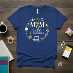 Navy blue t-shirt with "MOM mode ALL DAY EVERY DAY" text in a circular design surrounded by icons representing mom