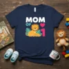 Mom of 1 t-shirt design featuring a mother lion and cub with leaves, heart, and the number 1
