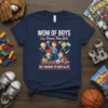 Mom of boys less drama than girls but harder to keep alive quote on a navy t-shirt with superhero mom