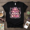 Mommy Mama Bruh quote in groovy pink font with floral and butterfly accents on a black t-shirt