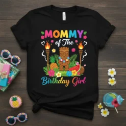 Mommy of The Birthday Girl text with tiki, torches, pineapple, and watermelon on a black t-shirt