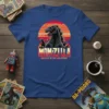 Momzilla Mother of The Monsters t-shirt featuring a Godzilla-like creature with bold typography and a sunset background