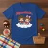 Monchhichi T-Shirt featuring two cute cartoon monkeys sitting on a cloud and eating watermelon, with the Monchhichi logo above