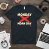 MONDAY X MOAN DAY text design with a red X and a drop of blood, on a navy t-shirt