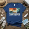 Montara California graphic t-shirt design featuring waves, a surfer, a vintage car, a palm tree, and a lighthouse