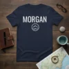 Navy blue t-shirt with "Morgan" in white text and a circular mountain graphic below