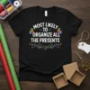 Black t-shirt with white text "Most Likely to Organize All The Presents" surrounded by Christmas presents and lights