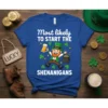 T-shirt with white text "Most likely TO START THE SHENANIGANS" and a cartoon leprechaun holding beer and a pot of