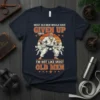 Vintage style t-shirt design with text "Most Old Men Would Have Given Up" and "I'm Not Like Most Old Men"