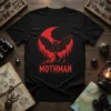 Black t-shirt with a red graphic of the Mothman creature standing on mountains under a red moon, featuring the text
