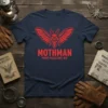 Navy blue t-shirt featuring a red Mothman graphic with "Mothman Point Pleasant WV" text, perfect for cryptid hunters