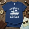 Motor Boat Captain t-shirt design with a stylized illustration of a man in a boat under a sun graphic