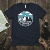 Mountains Clouds graphic t-shirt design with stylized mountain peaks and clouds in a circular emblem