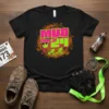 Black t-shirt with "MUD RUN 24" in neon pink and green, surrounded by a brown mud splatter graphic and running